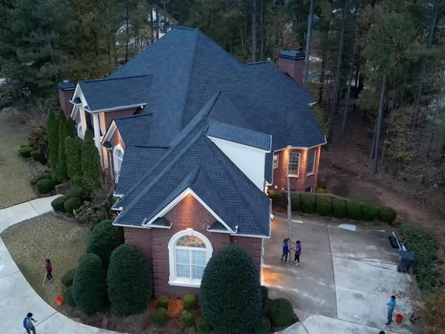 New architectural-shingle roof on a wooded Atlanta property
